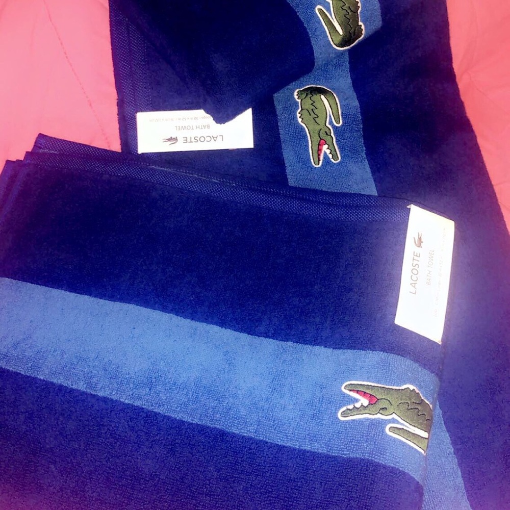 Authentic lacoste bath towel see picture for size.